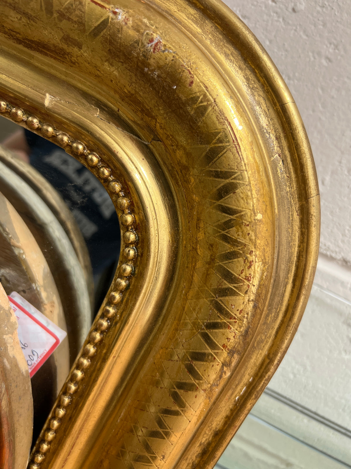 Gilded Louis Philippe Mirror with "X" Detailing and Beading