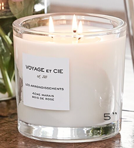 Three wick Voyage et Cie candle in clear glass container